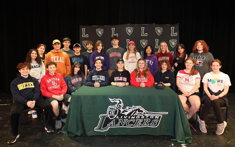 fine arts students at signing table